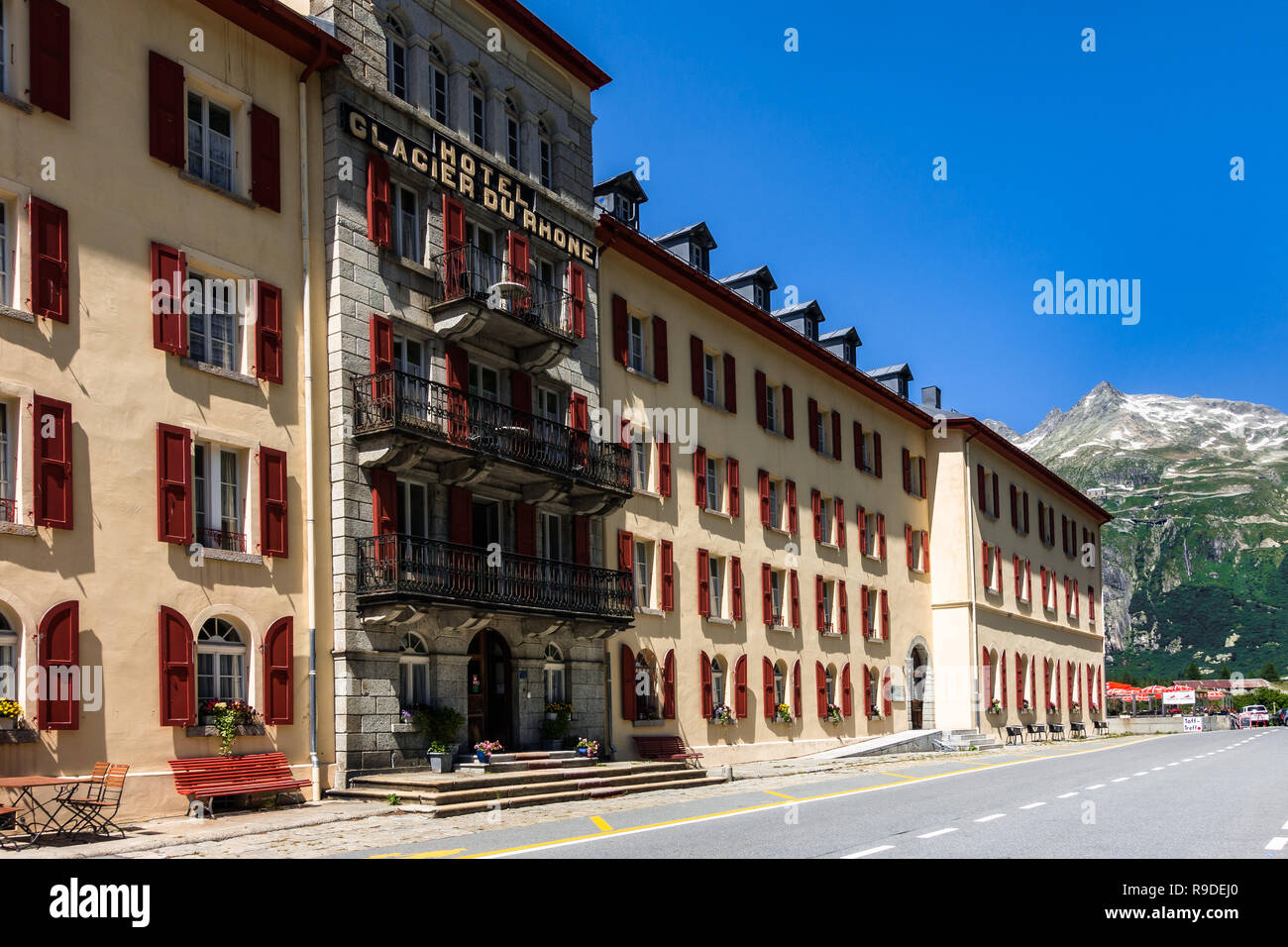 Traditional Swiss vintage Hotel Galcier du Rhone on the road of Furka Pass. Gletsch, Valais, Switzerland, July 2018 Stock Photo