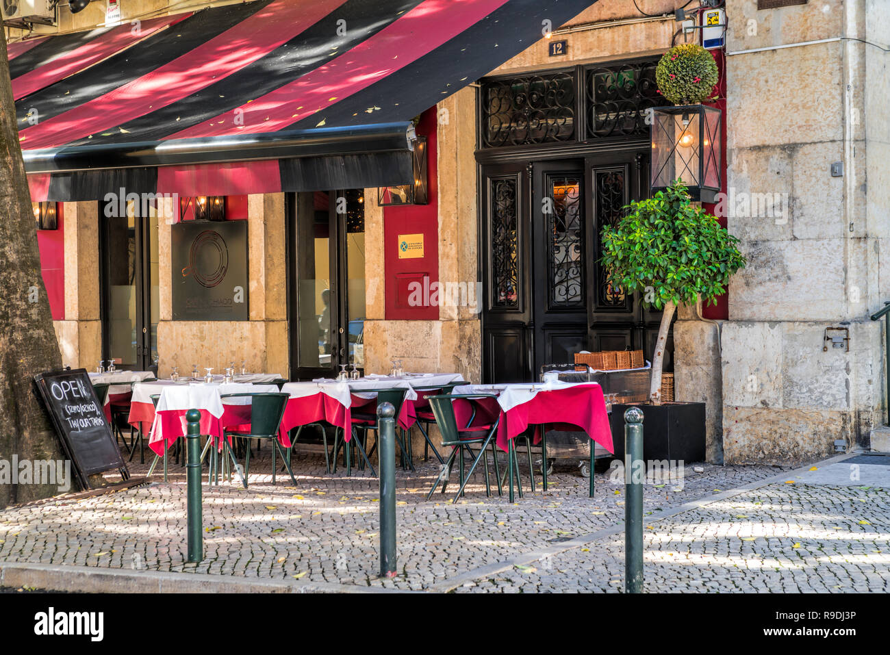 Street restaurant in downtown Lisbon Stock Photo