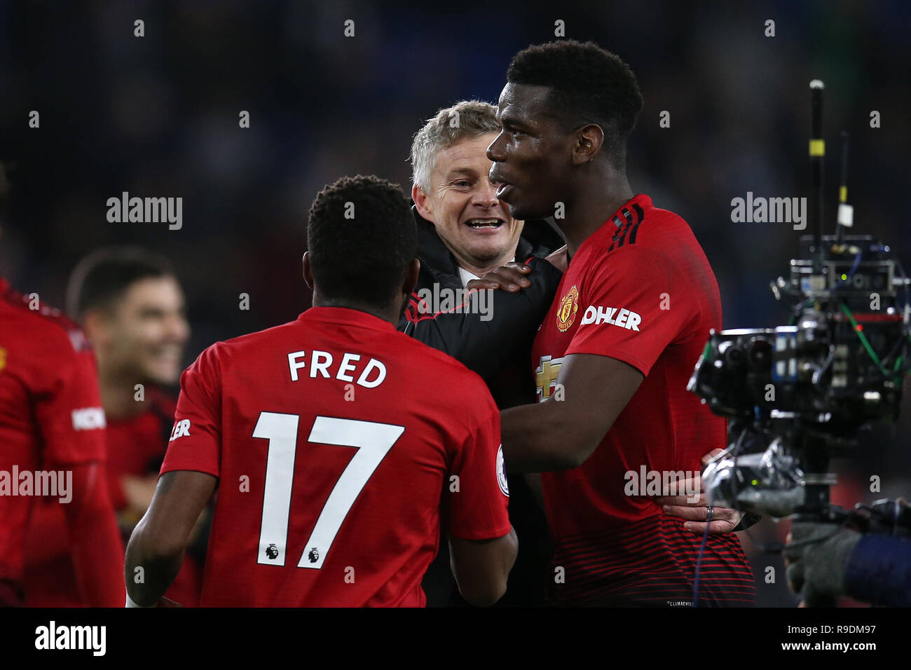 Cardiff, Wales, UK. 22nd Dec 2018. Ole Gunnar Solskjaer, the interim Manager of Manchester Utd celebrates with Man Utd players Fred and Paul Pogba after his teams win after the game. Premier League match, Cardiff City v Manchester Utd at the Cardiff City Stadium on Saturday 22nd December 2018.  this image may only be used for Editorial purposes. Editorial use only, license required for commercial use. No use in betting, games or a single club/league/player publications. pic by  Andrew Orchard/Andrew Orchard sports photography/Alamy Live news Stock Photo