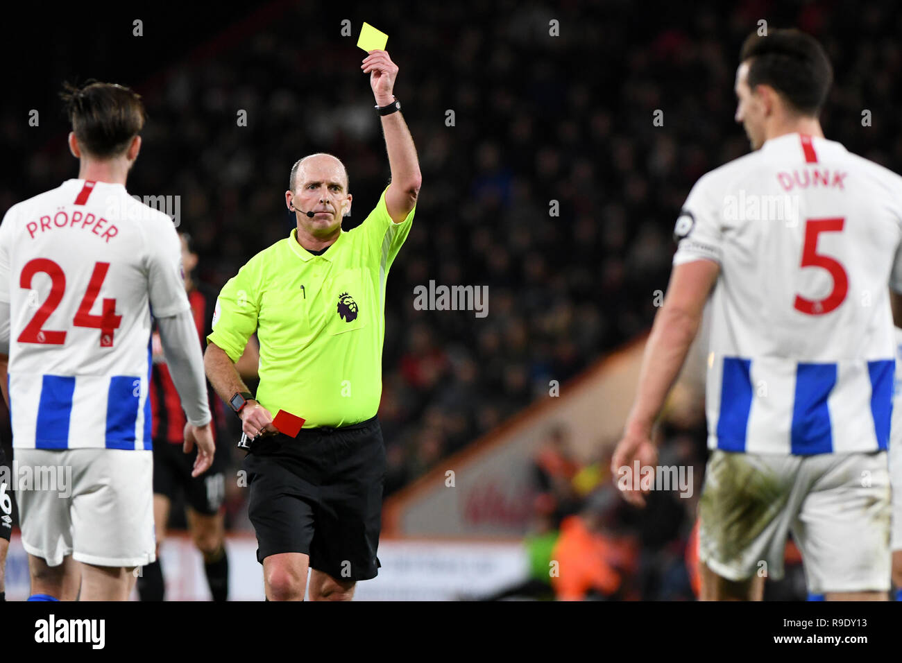 Bournemouth, UK. 22nd Dec, 2018. Referee Mike Dean shows Lewis Dunk of ...