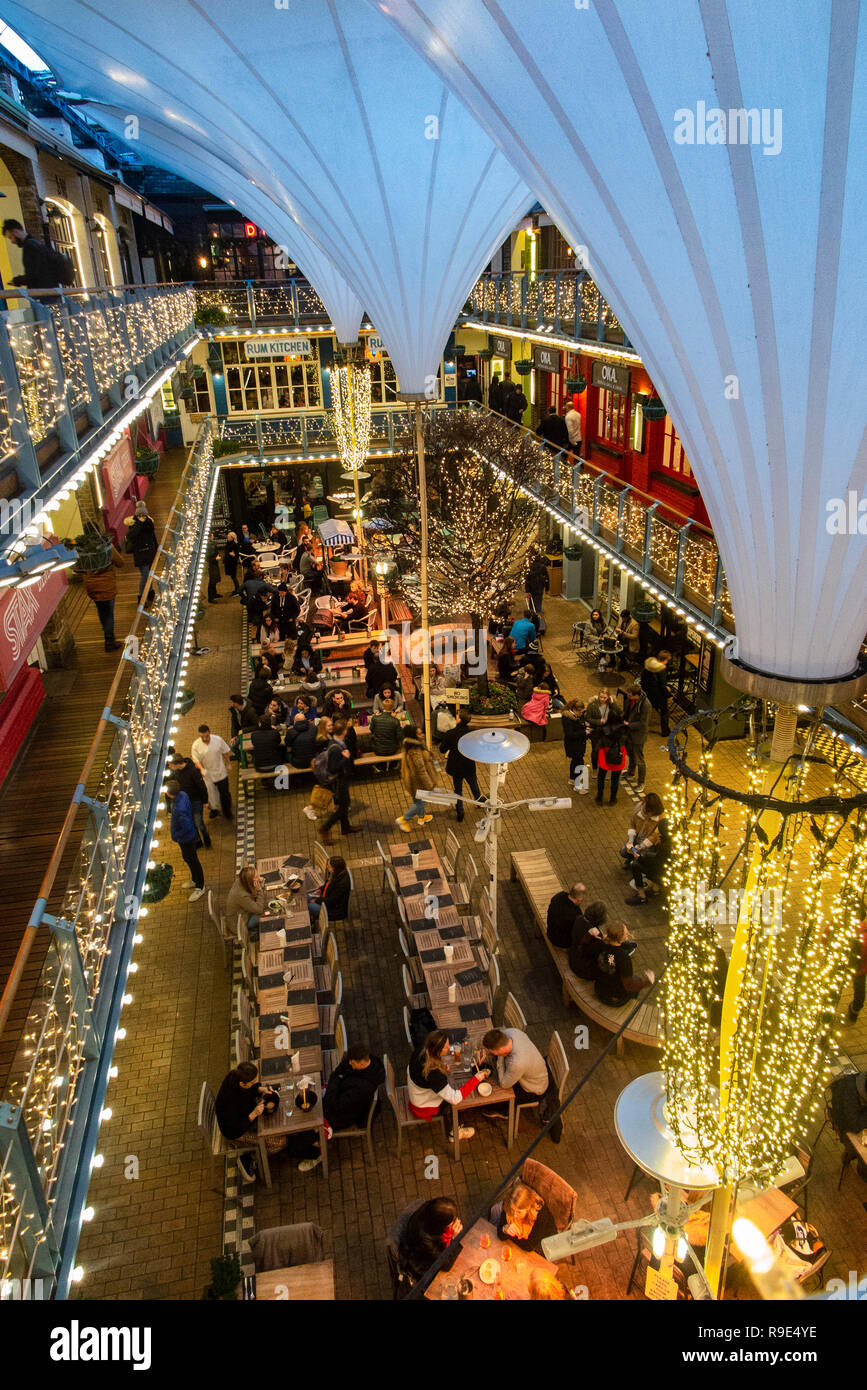An interior shot of a busy Kingly Court in Soho at Christmas time Stock
