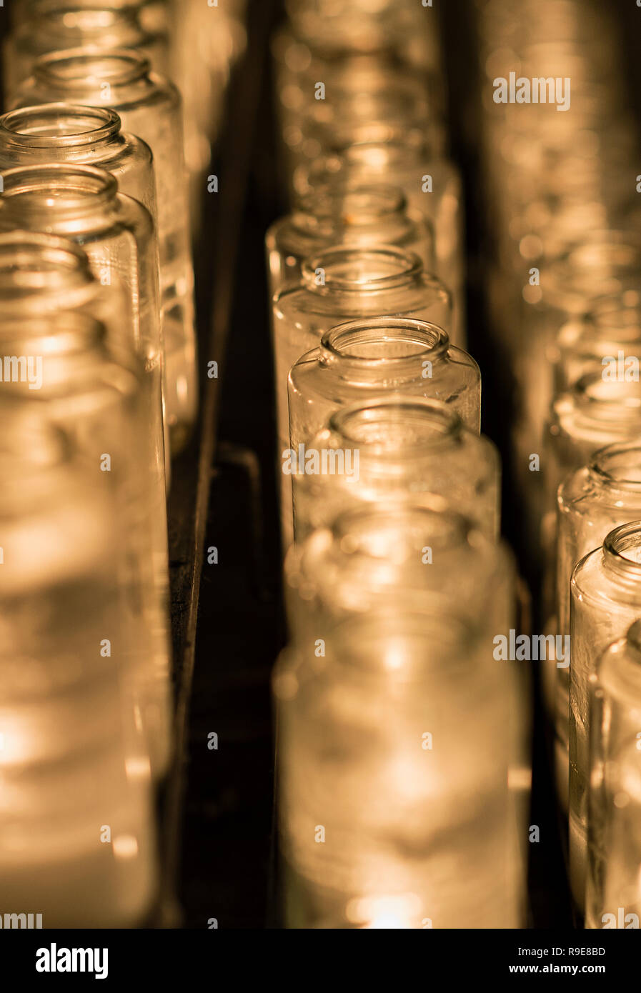 Votive candles in a catholic church. Stock Photo