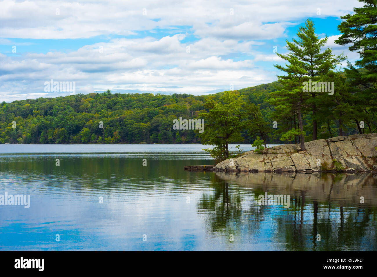 Lake in Sterling Forest, New York during beginning of Fall Stock Photo