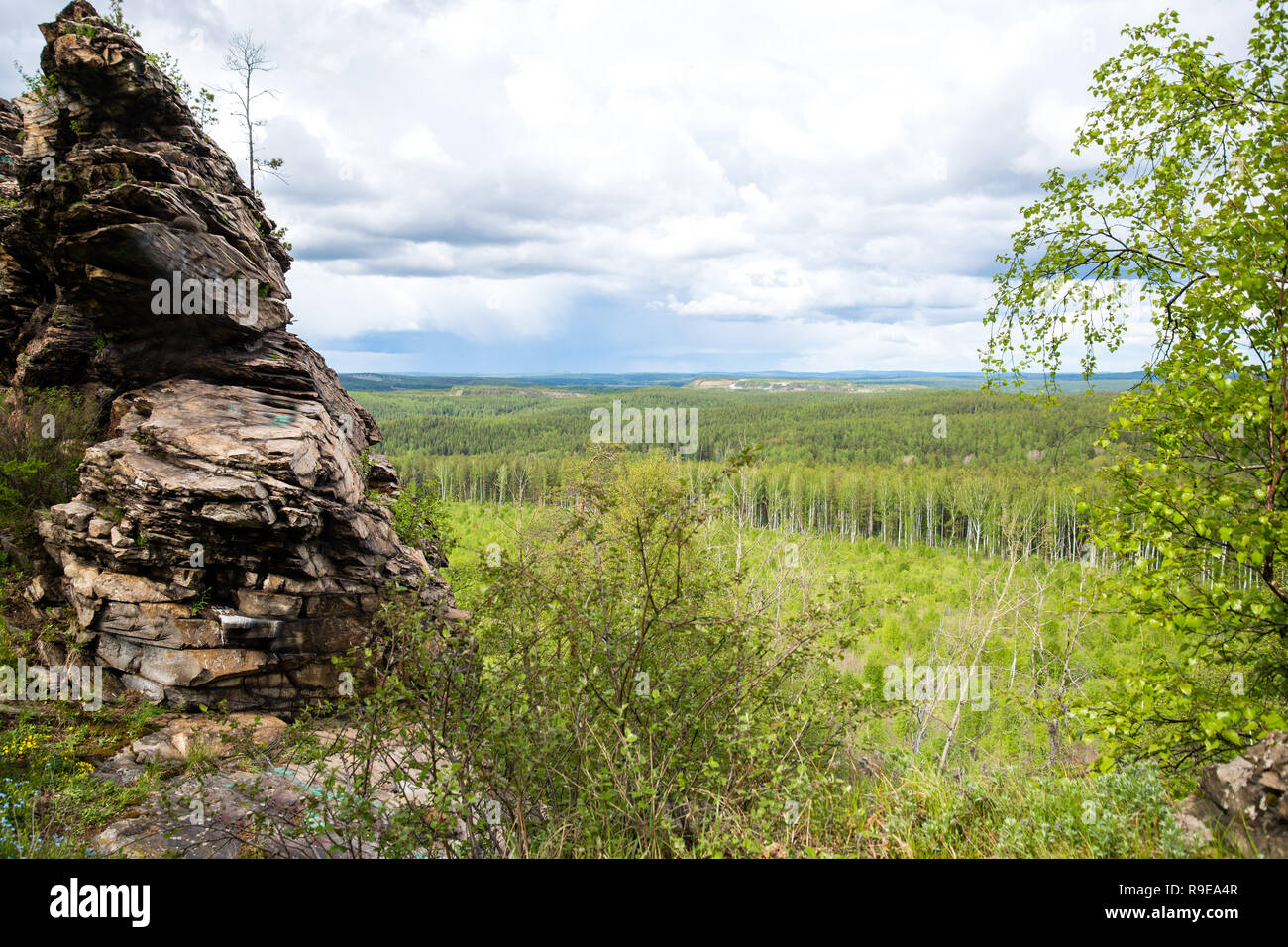 View on taiga. Rocks in the forest of Siberia Stock Photo - Alamy
