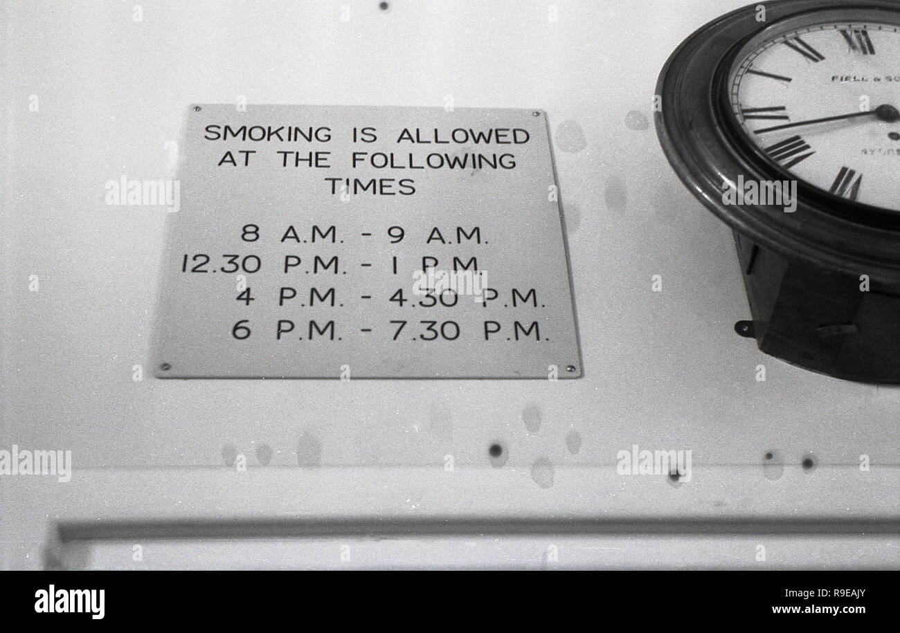 1948, notice in hospital, stating at what times smoking is allowed on the wards, England, UK. At this time it was felt that allowing patients to have a smoke was sensible for relaxation purposes and to prevent the difficulties of getting sick people outside. In addition it was not until several decades later that the really harmful effects of smoking tobacco were fully realised. Stock Photo