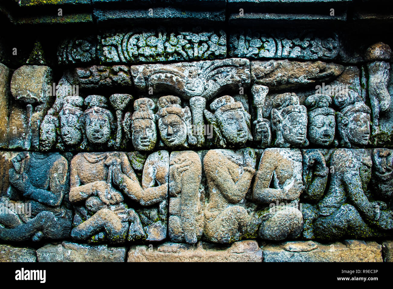 Beautiful ancient wall art relief of Buddhist temple complex Borobudur