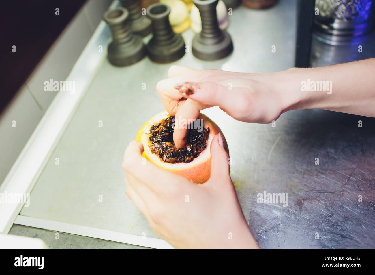 flavored hookah tobacco and fruit, a bowl of grapefruit Stock Photo Alamy