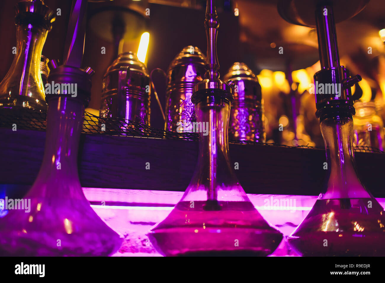 Hookah hot coals on shisha bowl with black background. Stylish oriental shisha. Shisha Concept