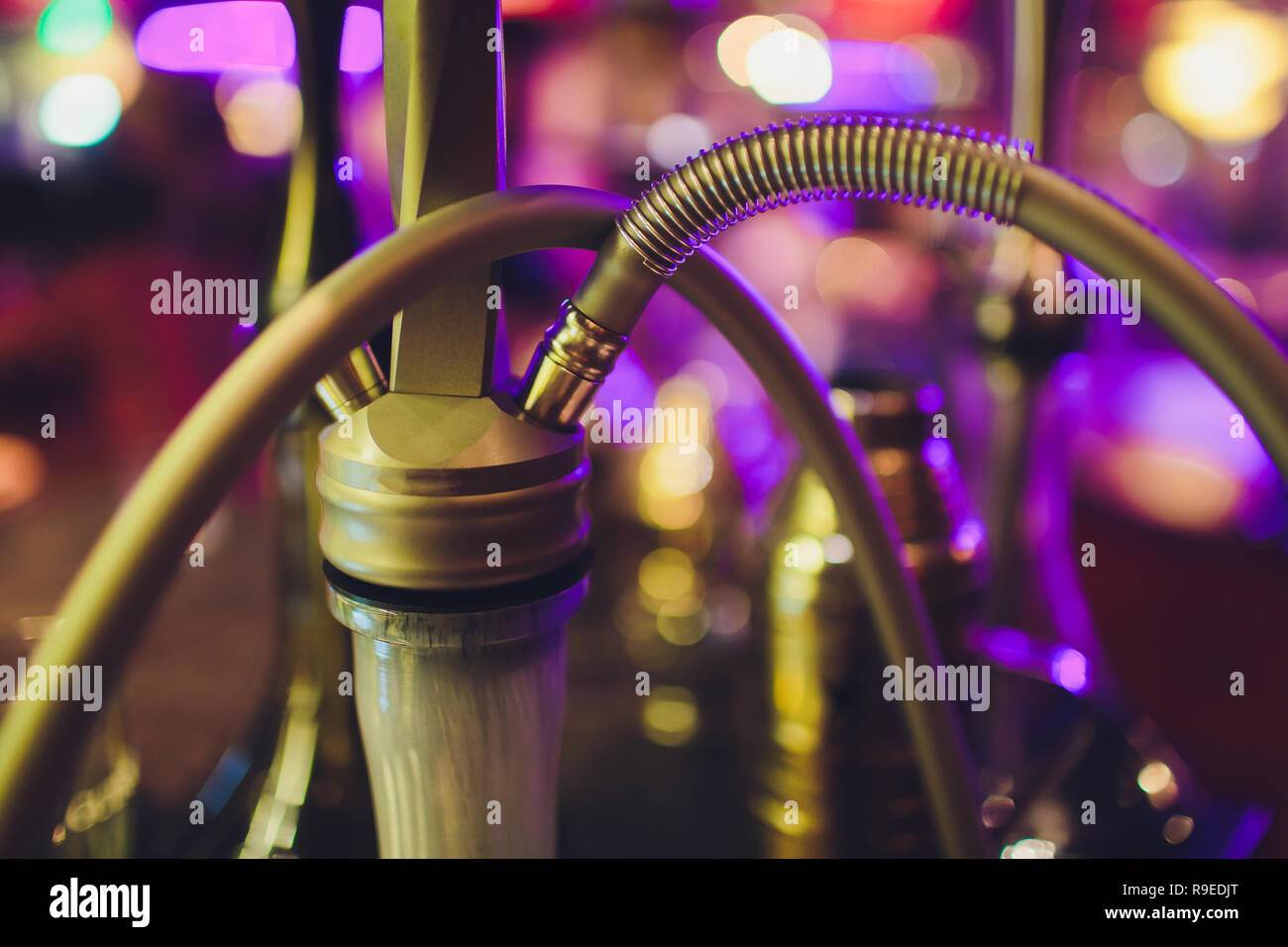 Hookah hot coals on shisha bowl with black background. Stylish oriental