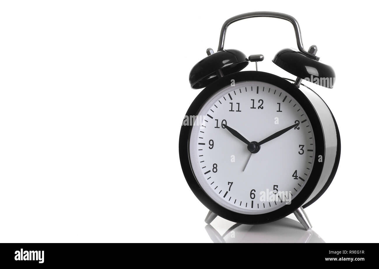 Black alarm clock isolated on white Stock Photo - Alamy
