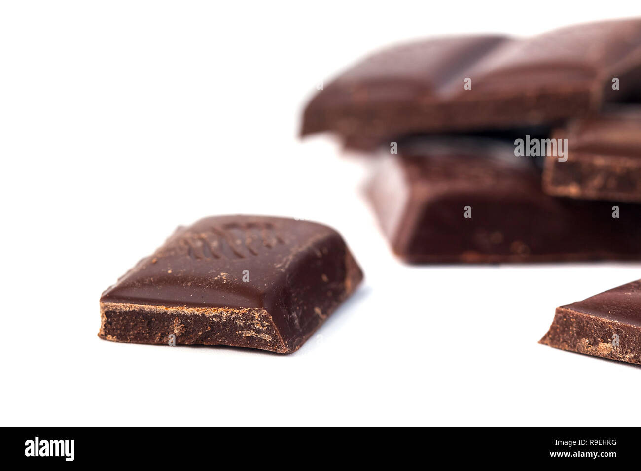 Dark Chocolate bars stack isolated on white background Stock Photo - Alamy