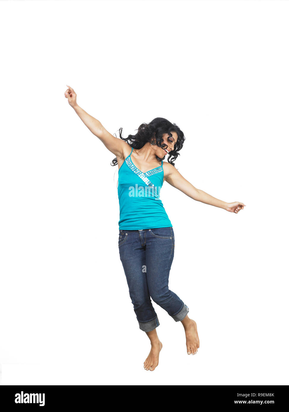 Excited woman jumping ocean hi-res stock photography and images - Alamy