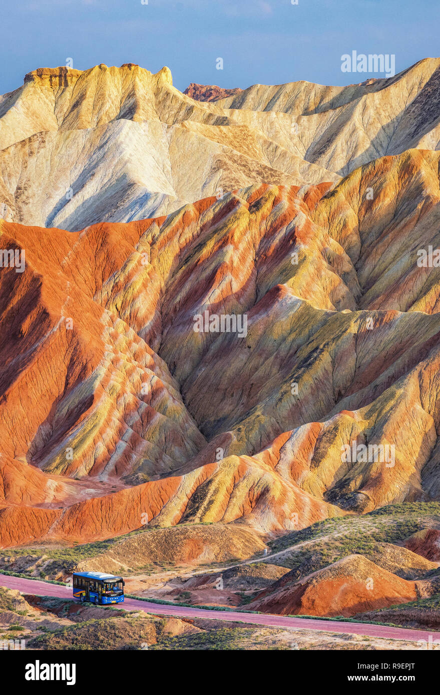 Colourful Danxia landscape captured in Zhangye National Geopark. The vibrant colours are caused by mineral present in the sandstone. Stock Photo