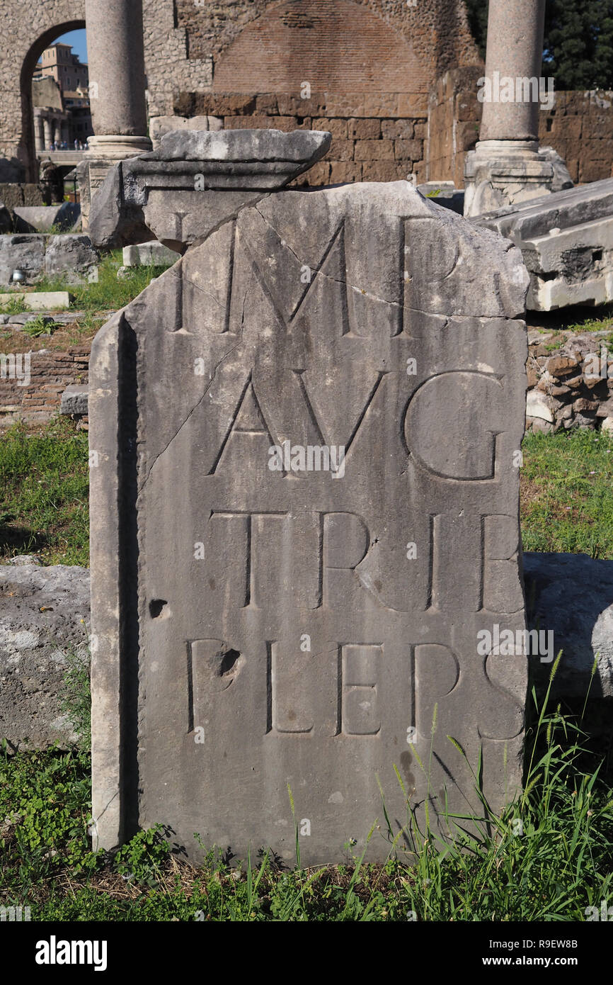 Fragment of a stone with latin script Stock Photo