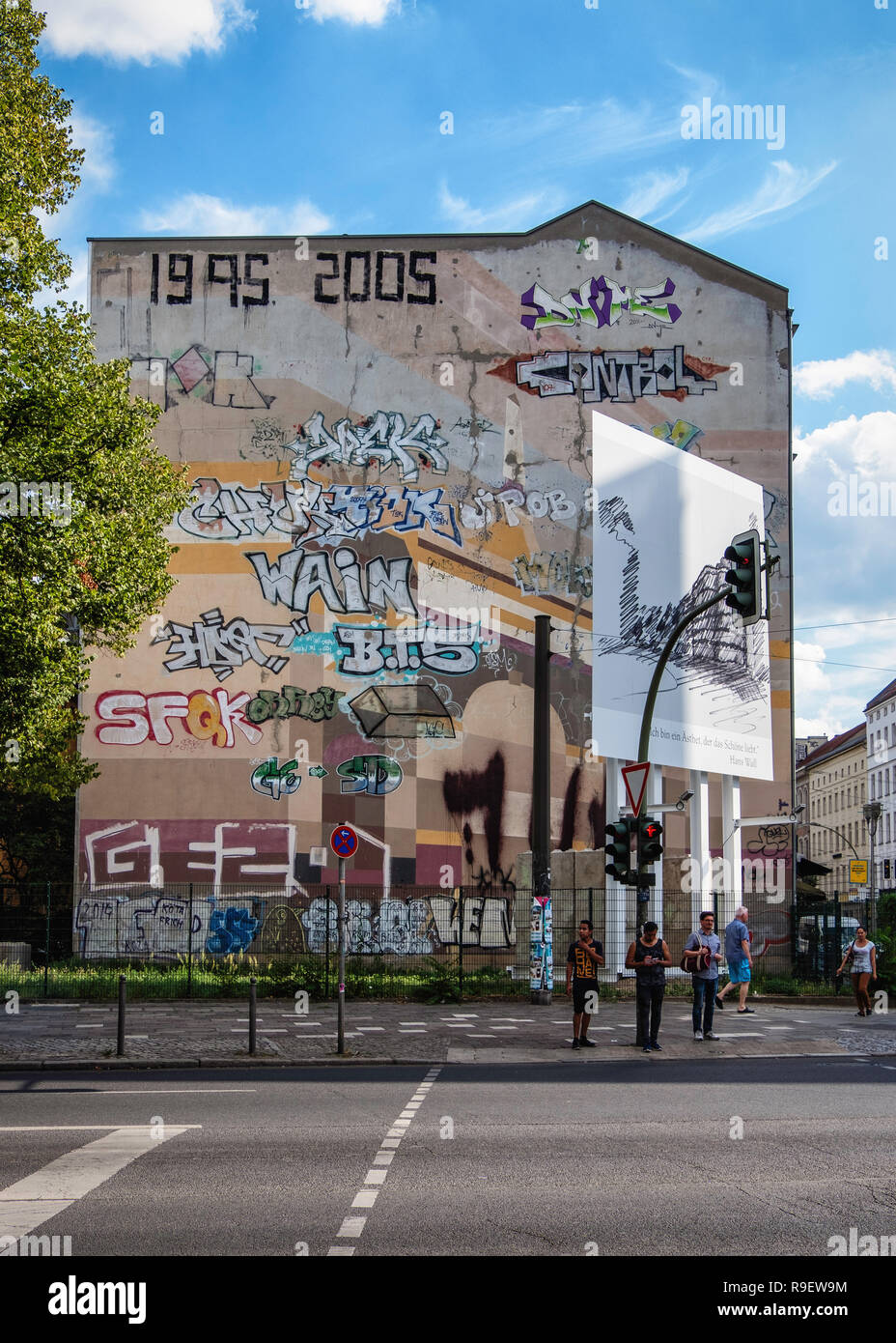 Berlin,Mitte,Cnr Torstrasse & Friedrichstrasse. Old building firewall with graffiti, City street view Stock Photo