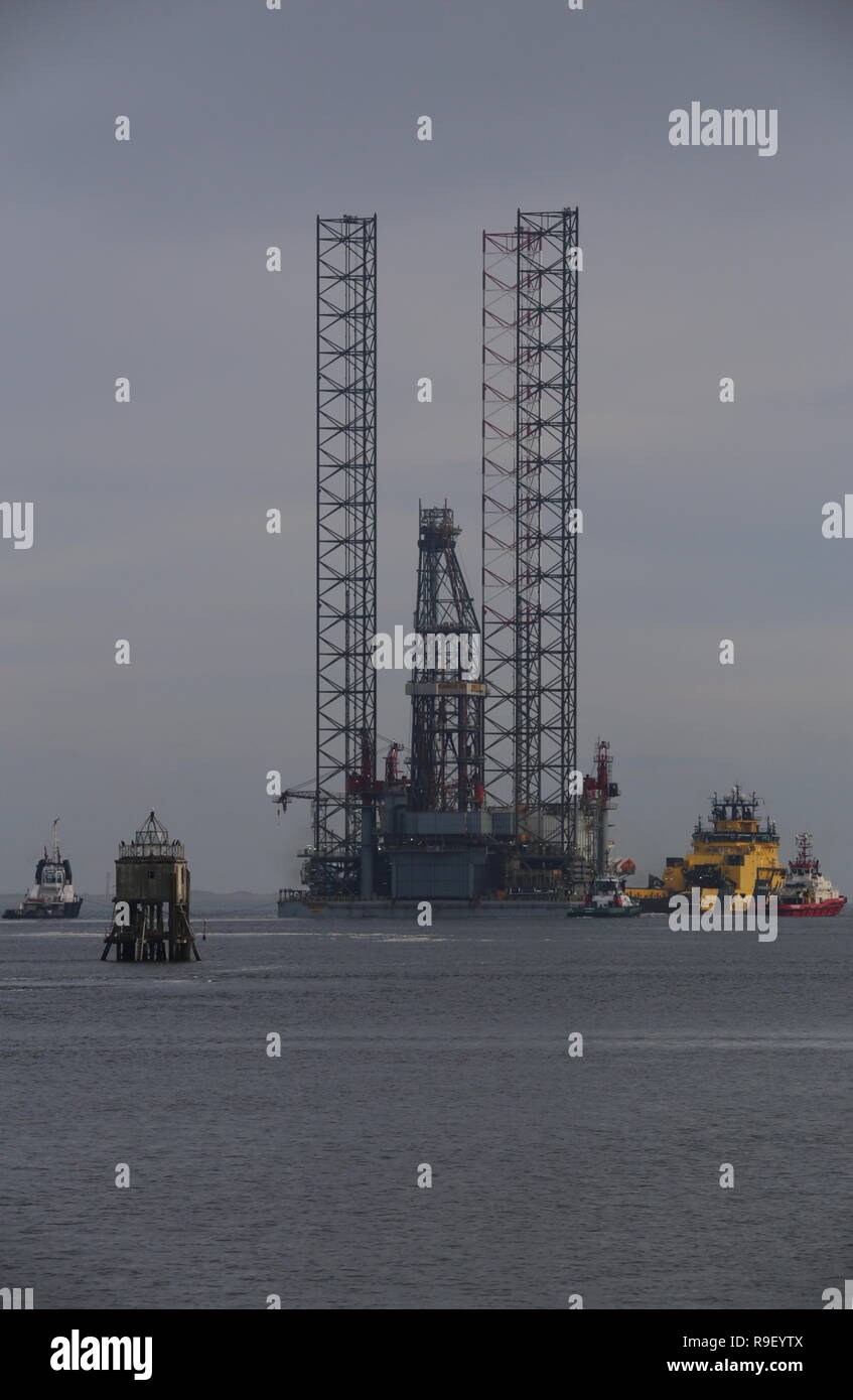 Drill rig ENSCO 121 under tow by Njord Viking in Tay Estuary Dundee Scotland  21st December 2018 Stock Photo