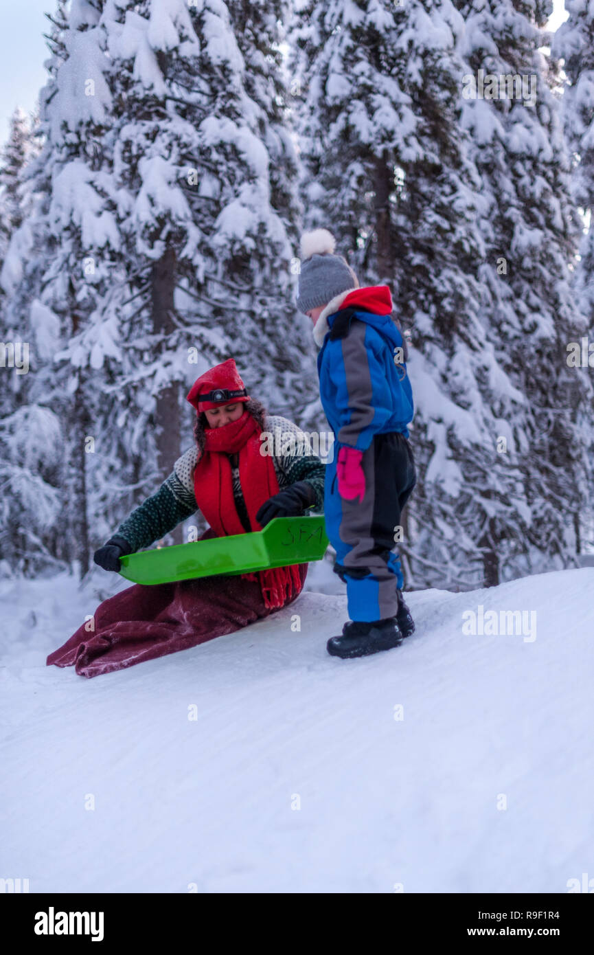 Sledging in lapland with the elfs Stock Photo