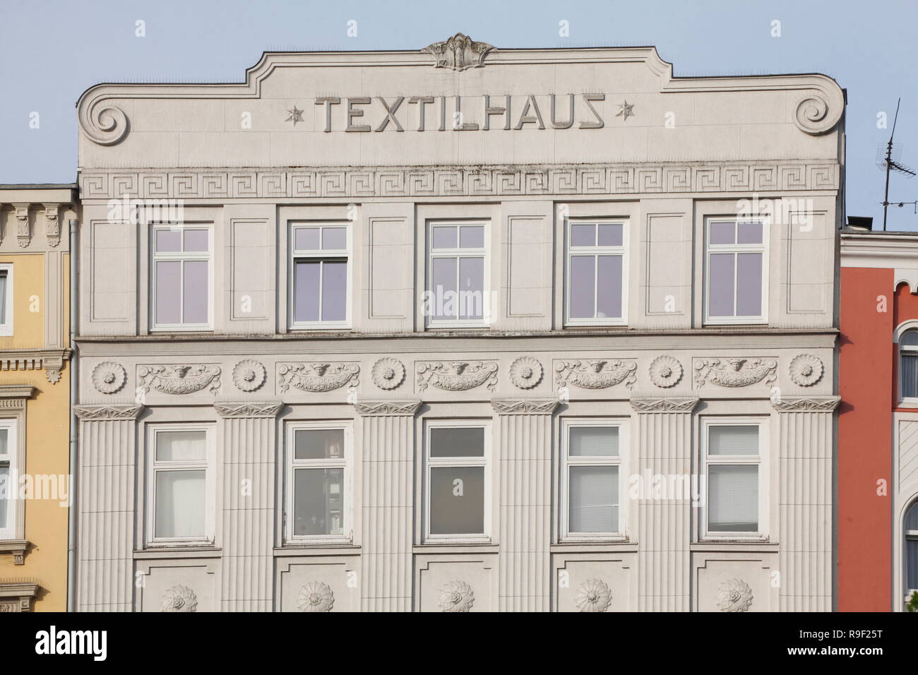 Historic house facade Textile House in the St. Georg StraÃŸe, district of St. Georg, Hamburg, Germany, Europe  I  Historische Hausfassade Textilhaus i Stock Photo