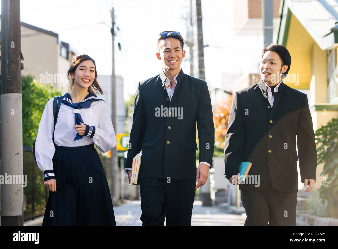 Yung Japanese Students With School Uniform Bonding Outdoors - Group Of 