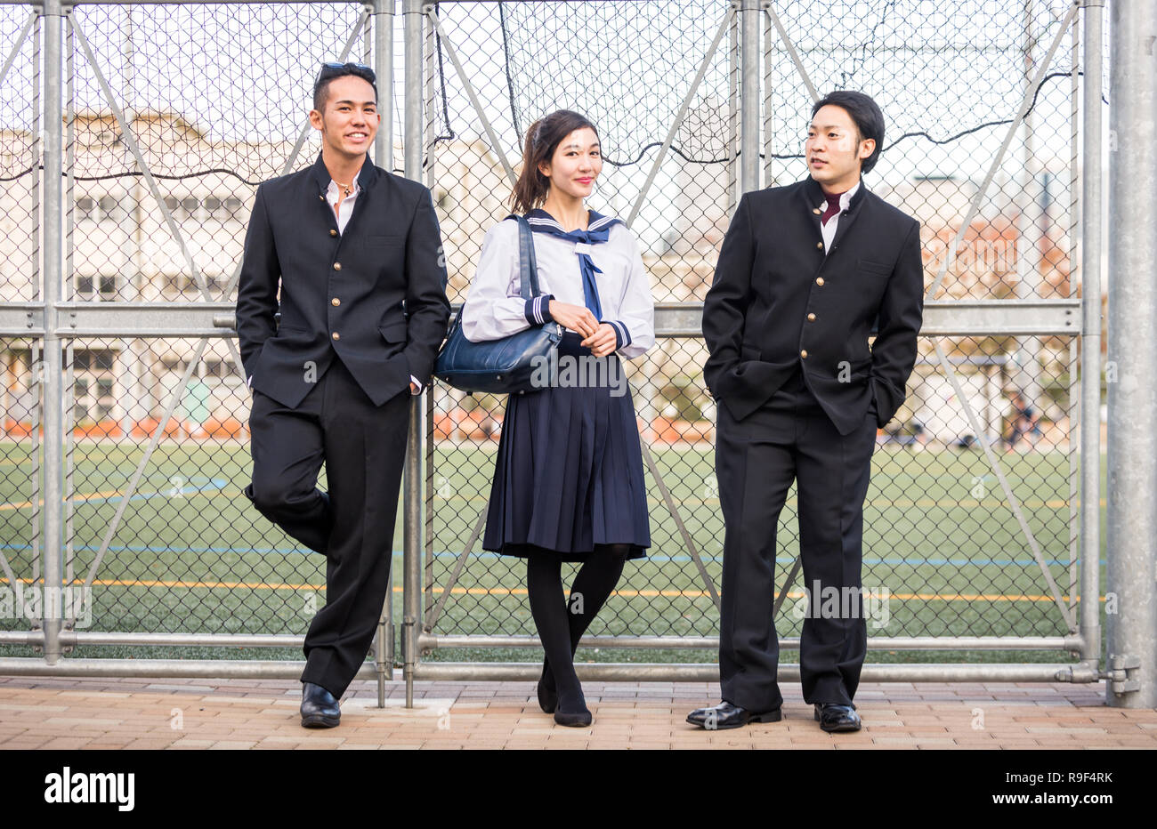 Yung japanese students with school uniform bonding outdoors - Group of ...