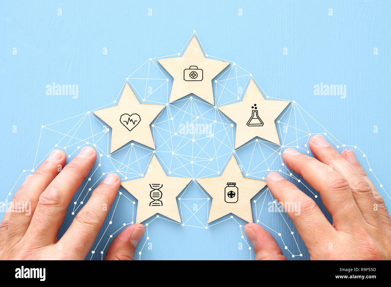 setting a five star medical service goal. healthcare and insurance concept Stock Photo - Alamy