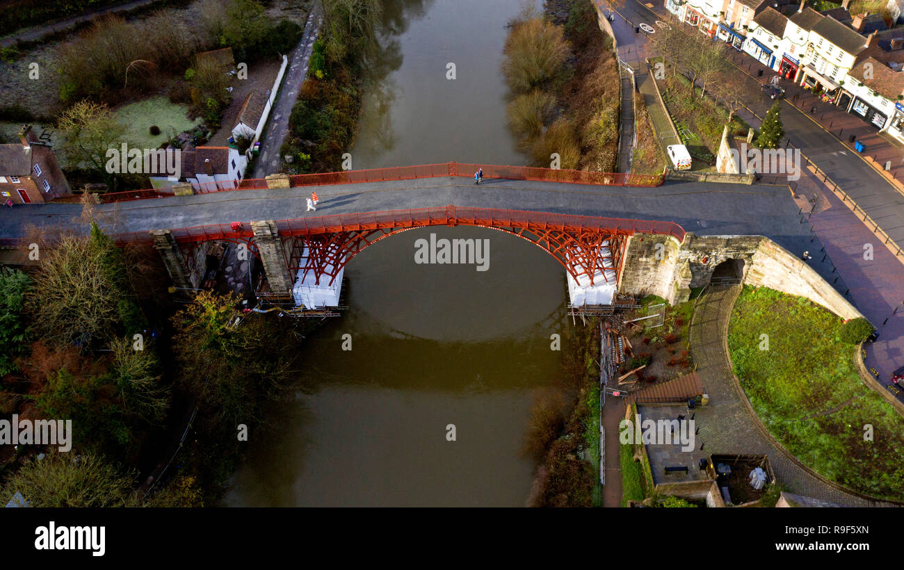 The worlds oldest Ironbridge in Shropshire unveiled in it's new colour of red after months of renovation work. The bridge has been dark grey for most of it's life but the restoration work revealed that the original colour was red. Stock Photo