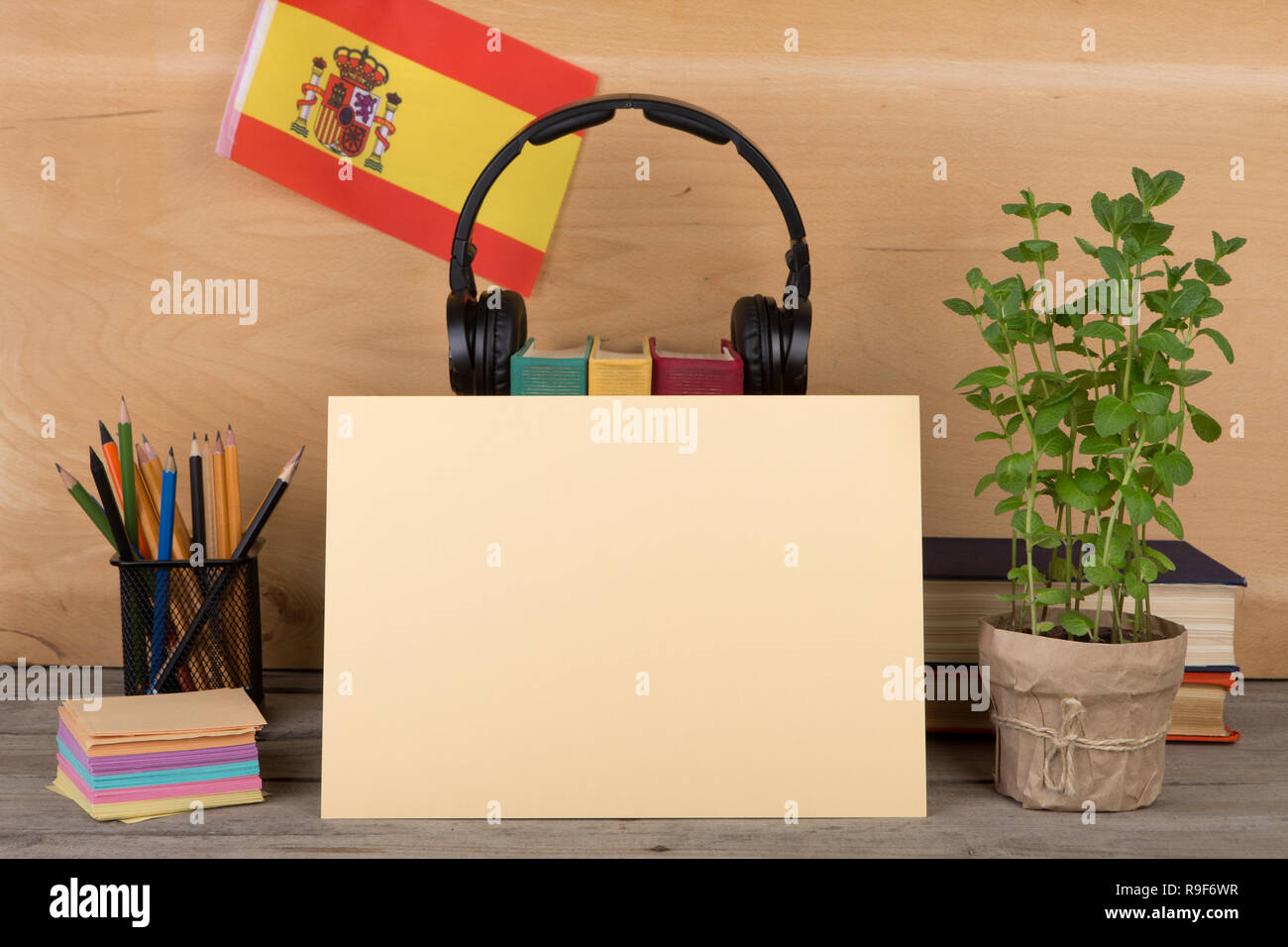 Concept of learning the spanish language blank paper, flag of the