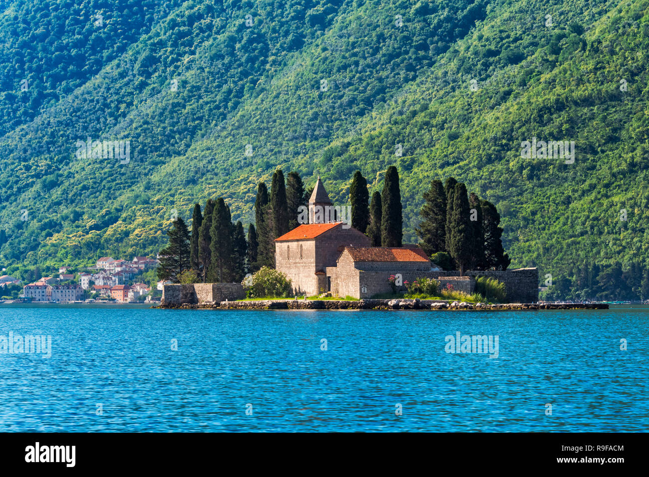 Saint George Island containing Saint George Benedictine monastery and old graveyard, Perast, Montenegro Stock Photo