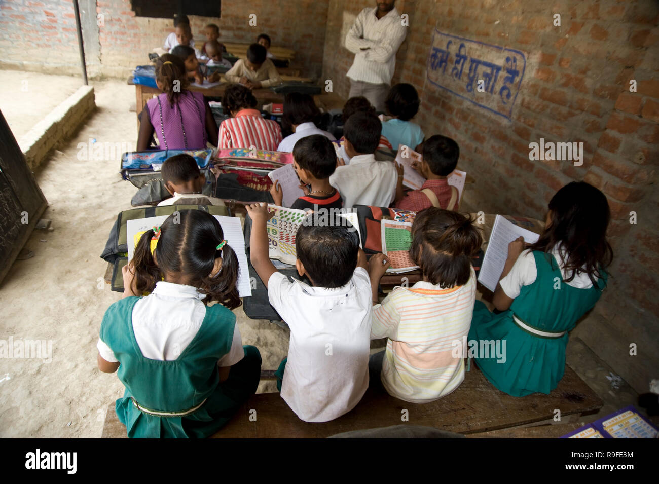 Varanasi / India 20 September 2011 School children studying in