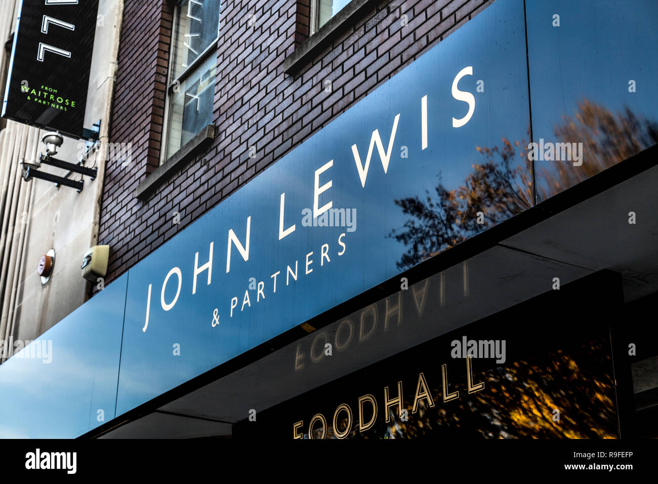 Logo Sign On The Facade Of The John Lewis Partners Oxford Street Department Store After Rebranding London Uk R9FEFP 