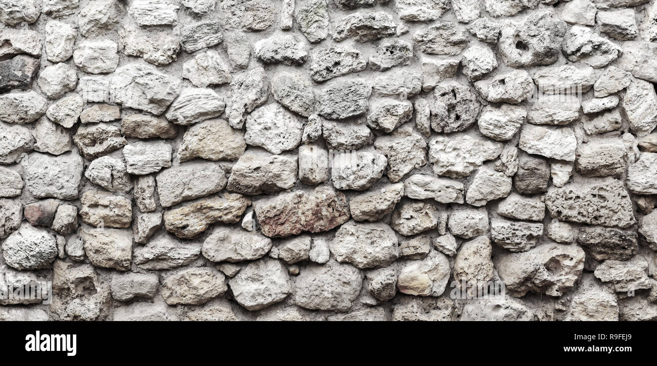 Old gray stone wall background photo texture, front view Stock Photo ...