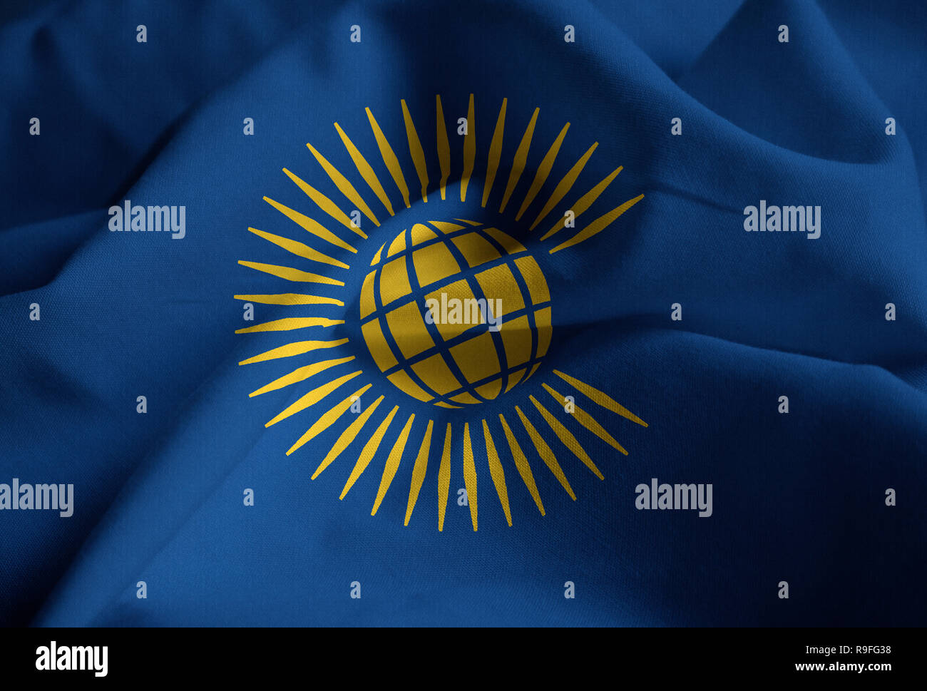 Closeup of Ruffled Commonwealth Flag, Commonwealth Flag Blowing in Wind Stock Photo