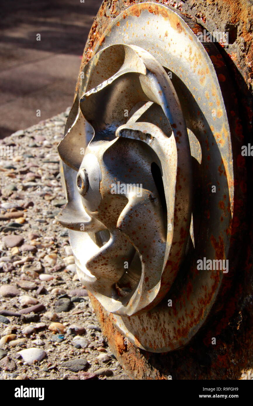 Impeller of a water pump. That impeller is heavily worn by sand Stock ...