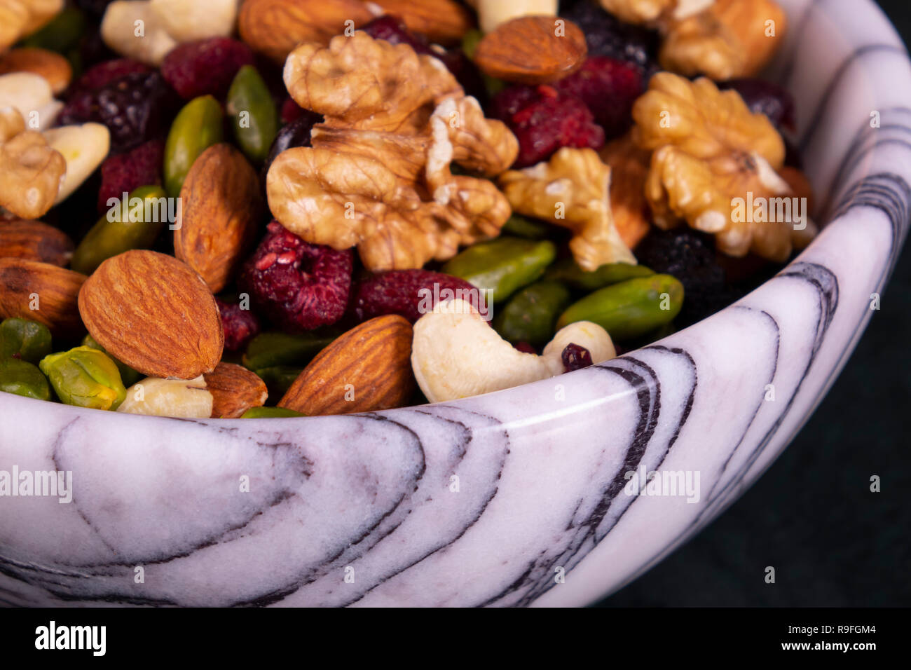 Nuts mix in a marble plate Stock Photo