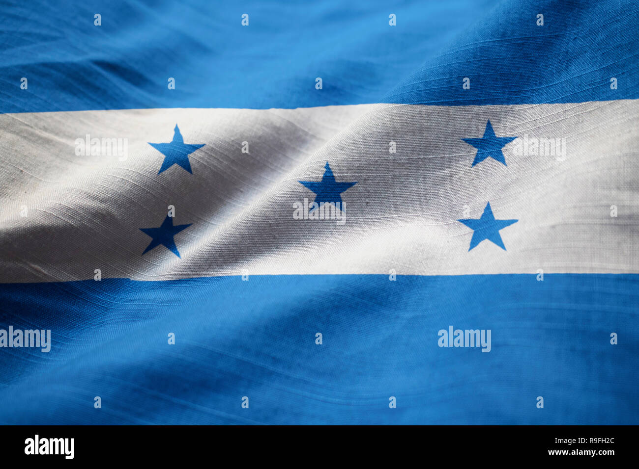 Closeup of Ruffled Honduras Flag, Honduras Flag Blowing in Wind Stock Photo