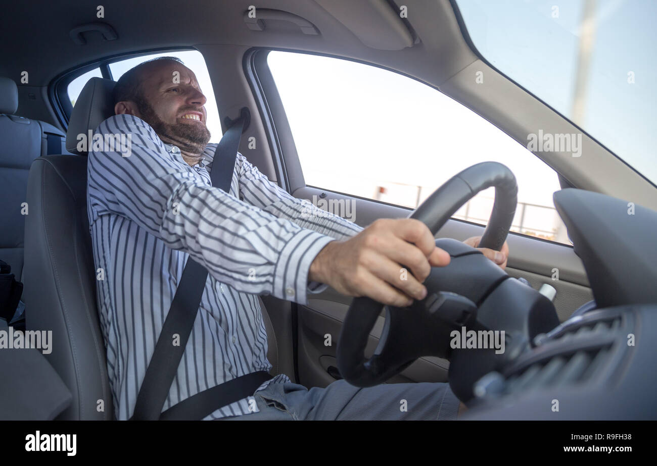 Aggressive and crazy driver in his car Stock Photo - Alamy