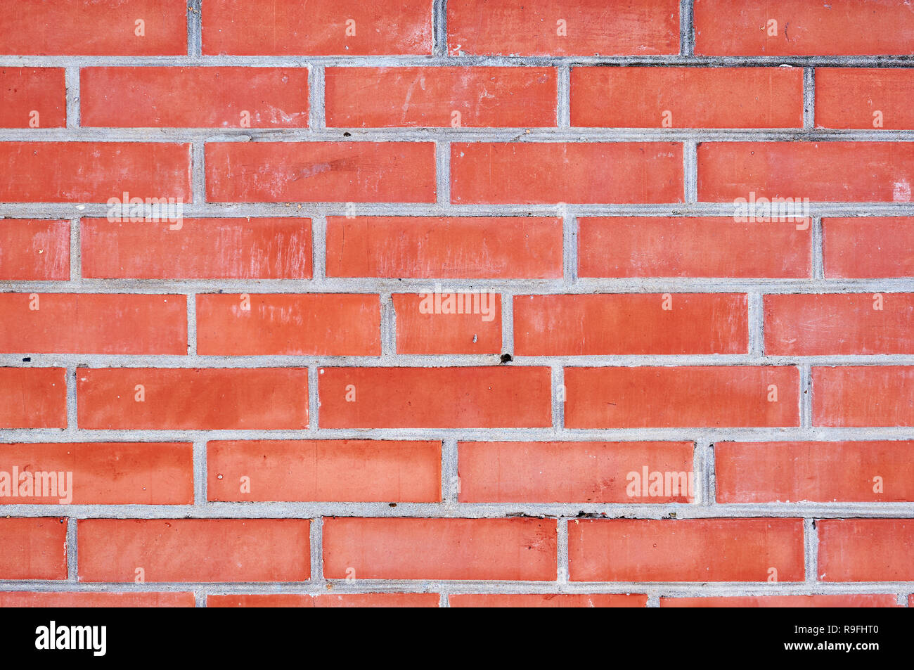 Empty red brick wall textured background. Stock Photo