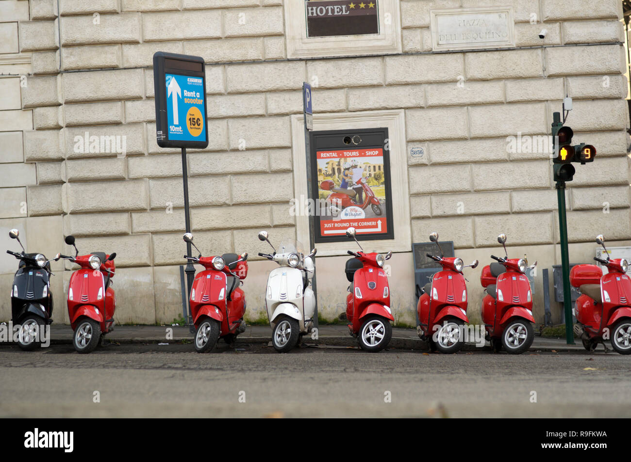 Vespa scooters for rent, parked outdoors, Rome, Lazio, Italy Stock Photo