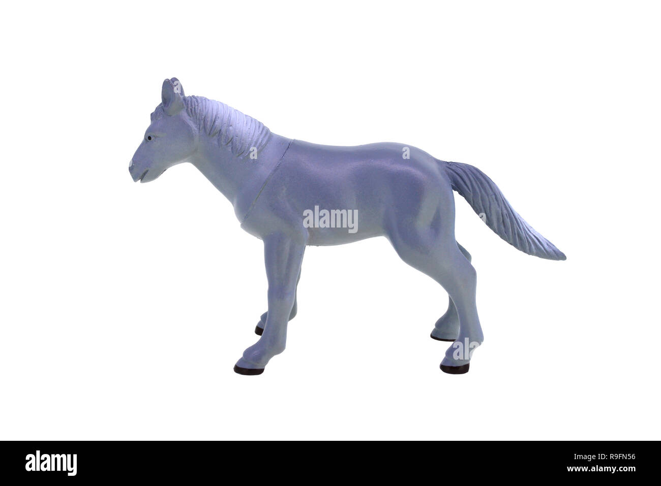 plastic toy horse isolated over white background Stock Photo