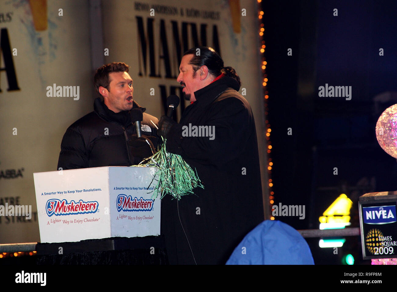 NEW YORK - DECEMBER 31:  Ryan Seacrest (L) attends the ceremony to lower the New Years Eve ball in Times Square on December 31, 2008 in New York City.  (Photo by Steve Mack/S.D. Mack Pictures) Stock Photo
