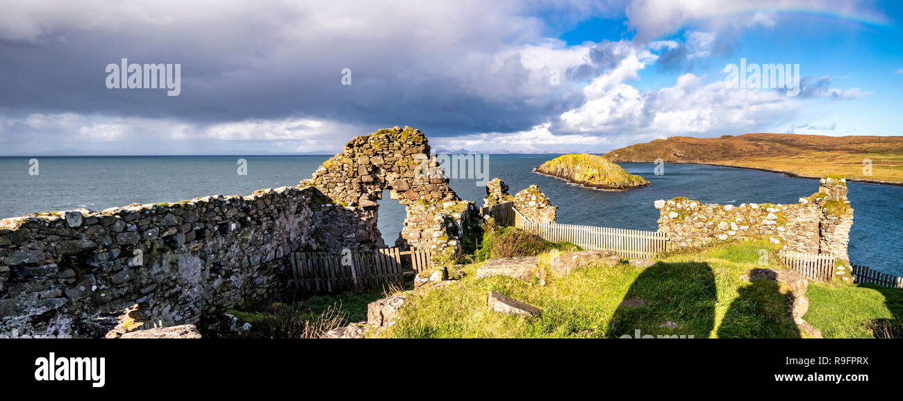 The castle ruins next to Tulm Island at Duntulm Bay on the Isle of Skye - Scotland. Stock Photo