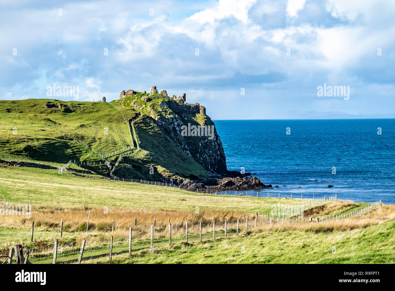 The castle ruins next to Tulm Island at Duntulm Bay on the Isle of Skye - Scotland. Stock Photo