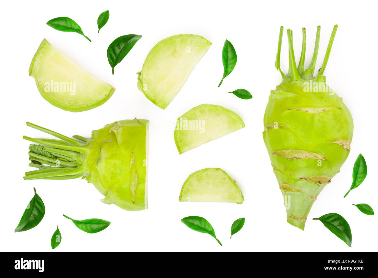 Fresh kohlrabi with green leaves isolated on white backround. Top view. Flat lay. Stock Photo