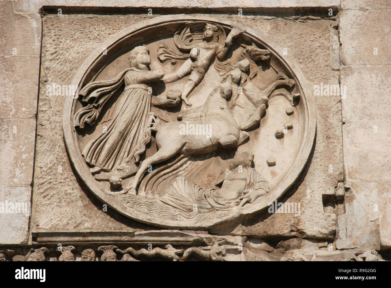 Roman Art. Arch of Constantine. Triumphal arch. It was erected to commemorate  Constantine victory over Maxentius at the Batlle of Milvian Bridge (October 28, 312). Reuse of parts of earlier buildings. Detail of medallion (relief). IV century AD. Rome. Italy. Europe. Stock Photo
