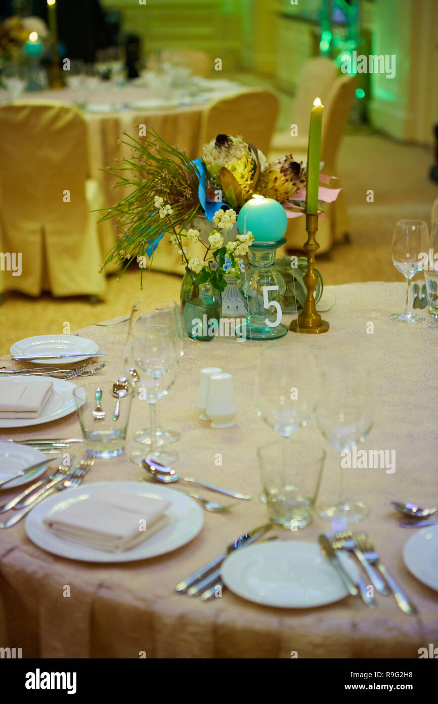 The Luxury Wedding Reception Dinner Table Setup Stock Photo