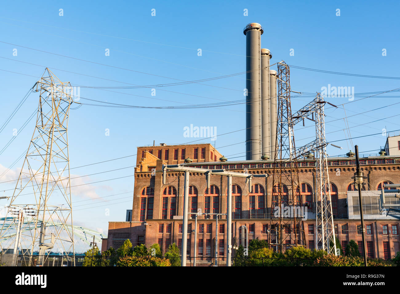 Electrical power plant with high voltage power lines Stock Photo
