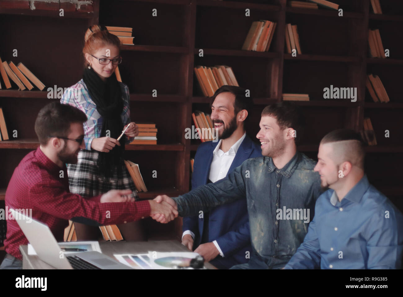 handshake of creative partners in the design Studio Stock Photo - Alamy