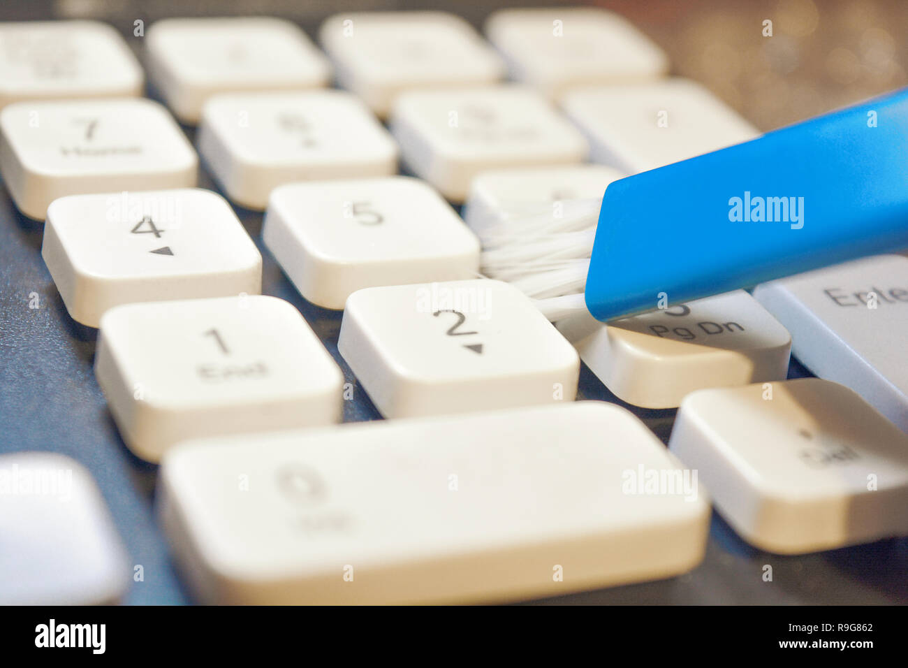Closeup photo of cleaning and caring computer and computer peripherals ...