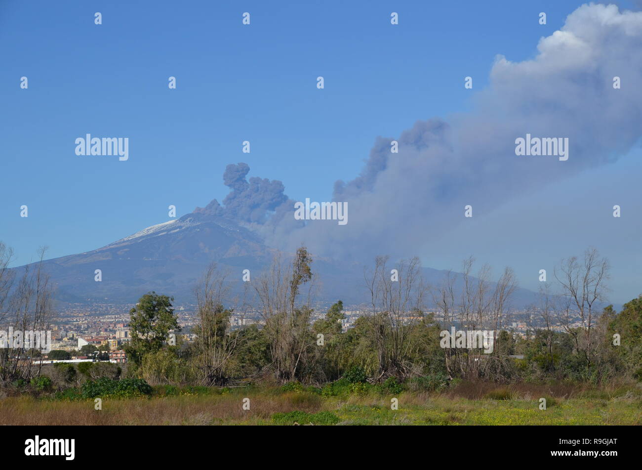 Catania, Sicily, Italy. 24th December, 2018. Europe's most active volcano, Mount Etna, in eruption in the afternoon. Credit: jbdodane/Alamy Live News Stock Photo