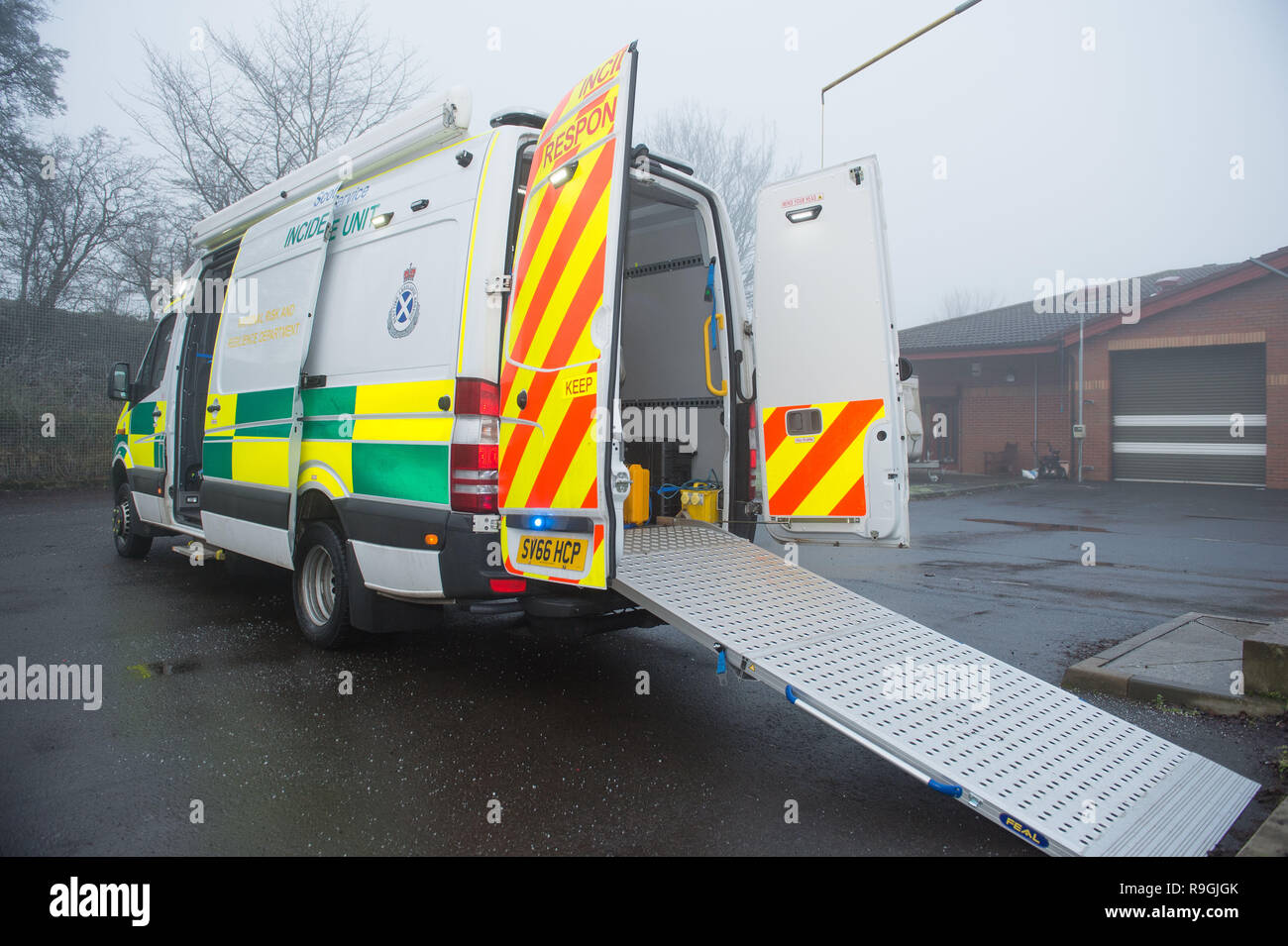 Johnstone, Glasgow, UK. 24th December 2018.  Scottish Health Minister - Jeane Freeman visits the Scottish Ambulance Service's Special Operations Response Team (SORT) where she  meets some of the paramedics who provide specialist ambulance care to patients during major incidents and in hazardous environments and being shown the specific equipment (ranging from bio hazards and ballistic suits, water rescue kit to ambulance specific kits to the actual specialist vehicles), used.  Credit: Colin Fisher/Alamy Live News Stock Photo
